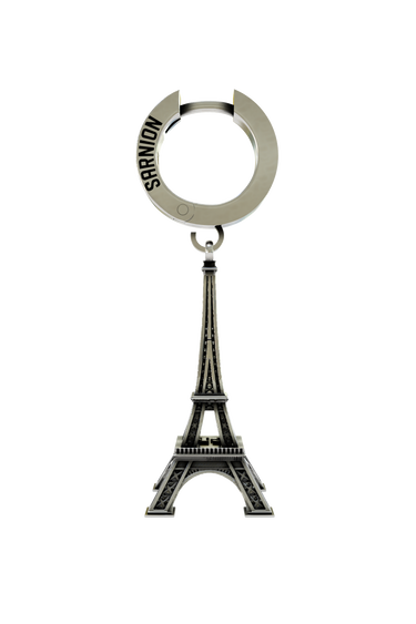 Parisian Tower Earring in 925 sterling silver - front view showcasing the iconic landmark charm and modern huggie hoop.
