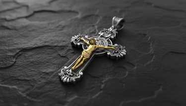 Profile angle of Saint Benedict Crucifix Pendant highlighting three-dimensional Jesus figure and decorative cross terminals