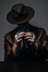 Rock Skull Pendant shown on a model to demonstrate its size and how it wears as a bold statement piece.