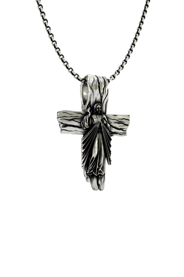 Sacred Cross Pendant shown on a model to demonstrate its size and wearability as a powerful piece of faith jewelry.
