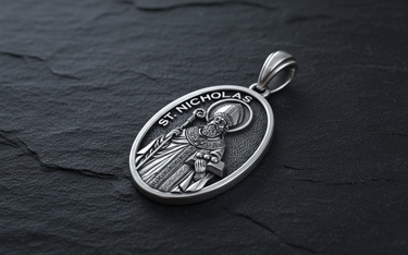 Saint Nicholas Medal Pendant sterling silver pendant on textured stone background showing dimensional depth and craftsmanship