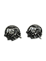 Side angle of the Charging Bull Cuffs in sterling silver, highlighting the three-dimensional musculature and sense of motion.