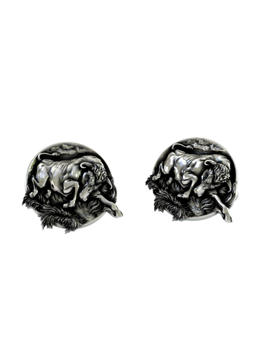 Side angle of the Charging Bull Cuffs in sterling silver, highlighting the three-dimensional musculature and sense of motion.