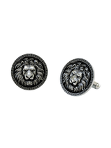 Side angle of the Lion Cufflinks in sterling silver, highlighting the high-relief sculpture and engraved Meander pattern.
