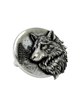 Side angle of the Lone Wolf Moon Cuffs in sterling silver, showing the impressive three-dimensional relief of the wolf's head.