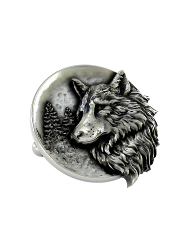 Side angle of the Lone Wolf Moon Cuffs in sterling silver, showing the impressive three-dimensional relief of the wolf's head.