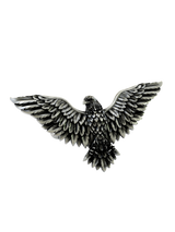 Side angle of the Soaring Eagle Cuffs in sterling silver, highlighting the three-dimensional form and detailed feather work.