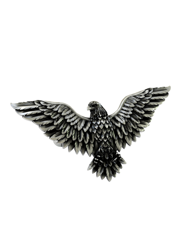 Side angle of the Soaring Eagle Cuffs in sterling silver, highlighting the three-dimensional form and detailed feather work.