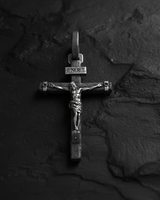 Side angle view of INRI Crucifix Pendant 925 silver cross featuring three-dimensional Jesus figure and textured wood design