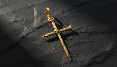 Side angle view of Nail Cross Pendant gold-tone sterling silver pendant showing dimensional rope binding detail