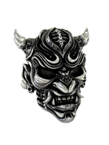 Side angle view of the Japanese Demon Cuffs in sterling silver, highlighting the three-dimensional sculpting and prominent horns.