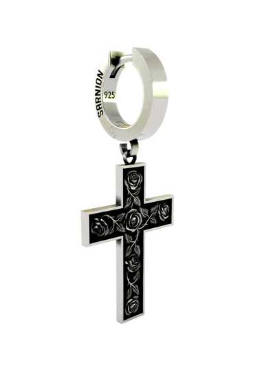 Side angle view of the Rose Cross Earring, highlighting the dimensional contrast between the polished frame and engraved face.