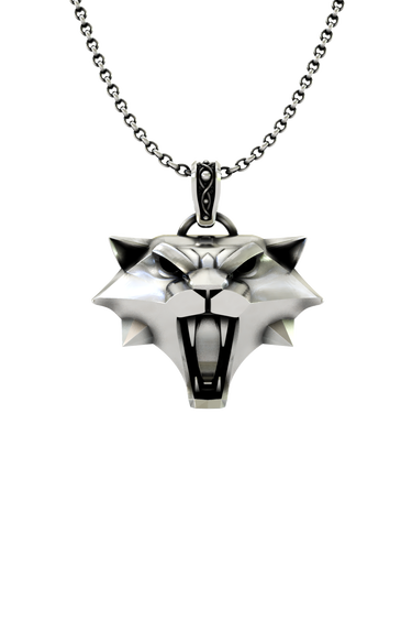 Side angle view of the Sterling Silver Cat School Pendant, highlighting the sharp, angular design and bared fangs