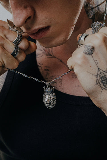Side angle view of the Sterling Silver Crowned King lion pendant, highlighting the intricate mane and crown details.