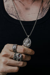 Side angle view of the Sterling Silver Gentleman Bear Pendant, highlighting the high-relief detail of the sculpture.