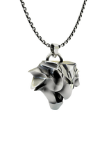 Side angle view of the Sterling Silver Griffin School Pendant, highlighting the complex, angular planes of the design.