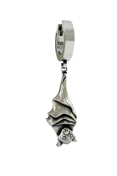 Side angle view of the Sterling Silver Hanging Bat Earring highlighting the unique upside-down sculptural design