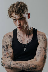 Side angle view of the Sterling Silver Military Hero Pendant, highlighting the 3D detail of the soldiers' gear.