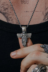 Side angle view of the Sterling Silver Sacred Cross Pendant, highlighting the 3D relief of the Jesus figure and textured cross.