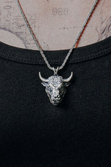 Side angle view of the Sterling Silver Taurus Bull Pendant, highlighting the polished horns and detailed fur texture.