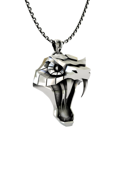 Side angle view of the Sterling Silver Viper School Pendant, highlighting the long, curved fangs and angular design.