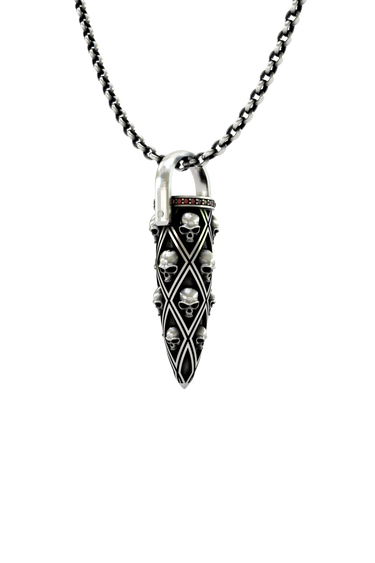 Skull Bullet Pendant shown on a model to demonstrate its substantial size and bold aesthetic.