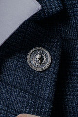 Solar Skull Cufflinks in 925 sterling silver - a direct front view showcasing the polished skull and radiant tribal sun pattern.