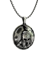 Spartan Warrior Pendant shown on a model to demonstrate its size and powerful aesthetic as a statement necklace.