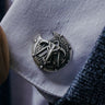 Spartan battle shield 925 sterling silver cufflinks - angled pair view showcasing the battle-damaged design and Greek key border.