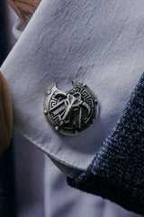 Spartan battle shield 925 sterling silver cufflinks - angled pair view showcasing the battle-damaged design and Greek key border.