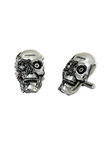 Steampunk Skull Cufflinks in 925 sterling silver - front view showcasing the mechanical details and Victorian filigree.