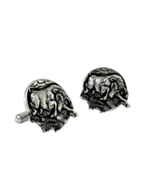 Taurus Power Cuffs shown on a shirt cuff to demonstrate their actual size and bold, confident appearance when worn.