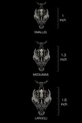 The Sarnion Head Pendant shown on a model to demonstrate the size of this signature brand piece.