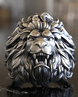 Oxidized 925 sterling silver lion ring front view highlighting the fierce, symmetrical face and detailed fangs.