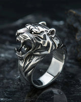 925 sterling silver tiger ring with roaring tiger head design and oxidized finish on dark background
