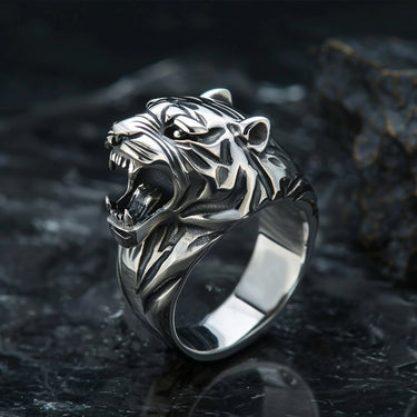 925 sterling silver tiger ring with roaring tiger head design and oxidized finish on dark background