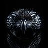 925 sterling silver eagle ring with detailed feathers and piercing eyes displayed on dark background