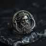 925 sterling silver Poseidon ring with detailed Greek god face and serpent design on dark stone background