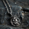 925 sterling silver Jesus Christ pendant with Crown of Thorns detail on weathered stone background showing oxidized finish