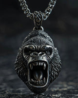 925 sterling silver gorilla head pendant with roaring mouth and detailed fur texture on dark background