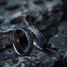 925 sterling silver hammered textured rings with honeycomb pattern displayed on dark stone surface background