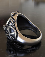 Detailed profile view of the Christian Lamb of God ring, highlighting its solid construction and the smooth finish of the 925 silver band.