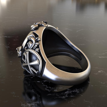 Detailed profile view of the Christian Lamb of God ring, highlighting its solid construction and the smooth finish of the 925 silver band.