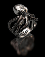 Studio product shot of the Silver Octopus Ring on a black background, highlighting the 925 silver stamp and tentacle details.