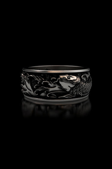 Studio render of a 925 sterling Silver Koi Fish Ring on a black background, highlighting the swimming koi and wave details.