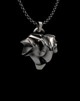 Three-quarter angle view of the sterling silver Witcher Griffin Pendant, highlighting its 3D depth and sharp, sculptural lines.