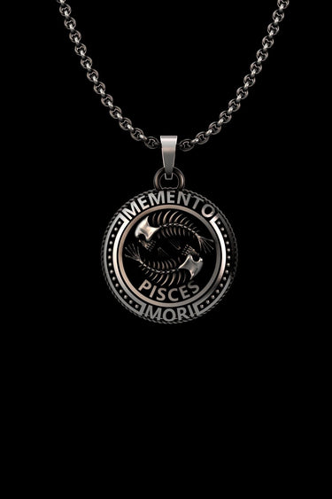 Silver Pisces Mori Pendant on a chain, showing two fish skeletons in a yin-yang design with 'Memento Mori' text.