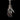 Silver Mystic Hand Pendant showing intricate knuckle details with twelve red crystal stones, hanging on a chain.