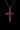 Angled view of the sterling silver ruby cross pendant showcasing the prong settings and brilliant facets of the red stones.