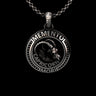 Silver Capricorn skull pendant with 'Memento Mori' text, featuring a detailed goat skull design on a sterling silver chain.